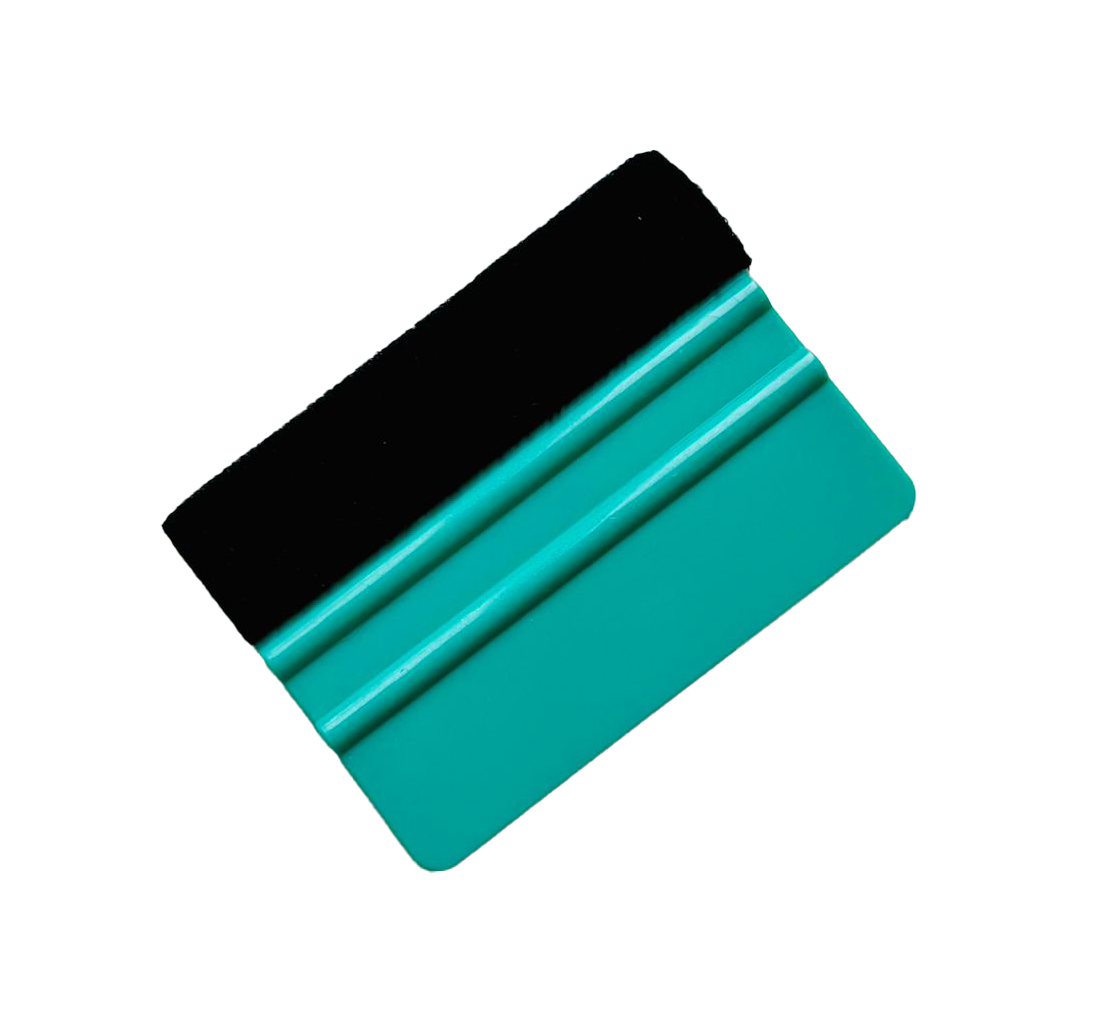 A turquoise squeegee with a black felt tip for applying wallpaper or vinyl