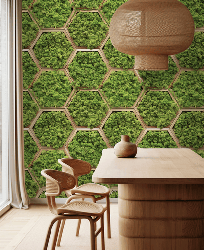 Dining area with wooden table and chairs against a green hexagonal patterned wall.