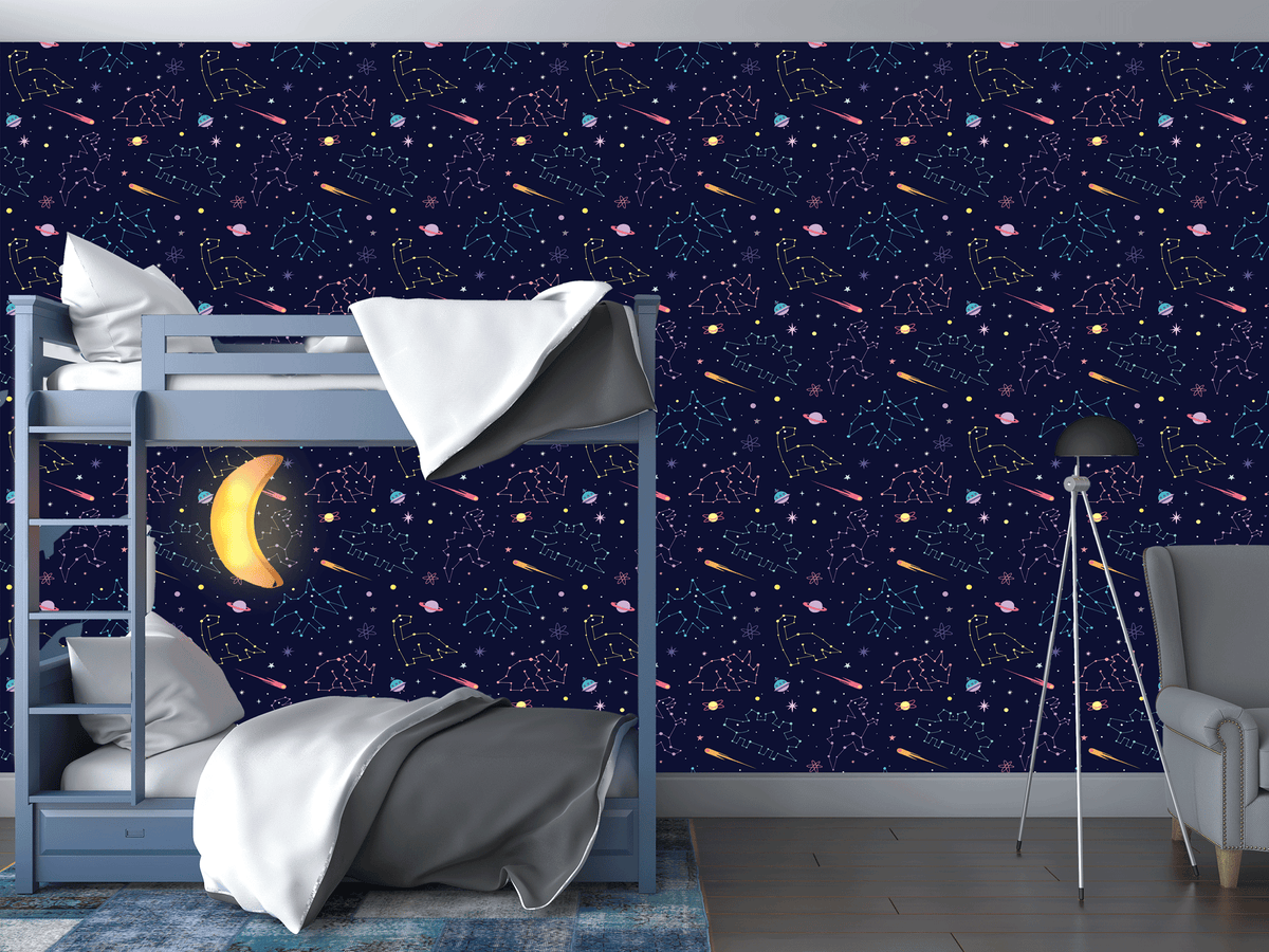 Children's bedroom with a bunk bed against a starry night wall mural.
