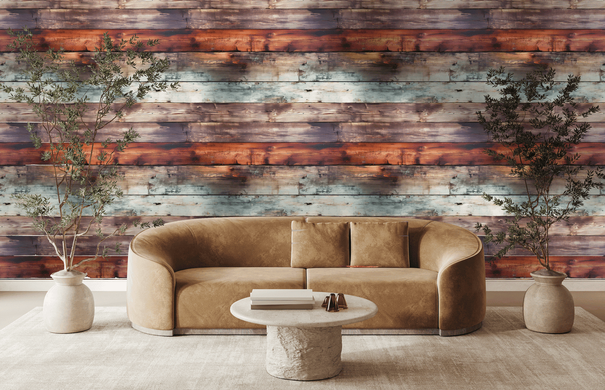 Beige sofa in a room with a wooden wall and decorative plants.