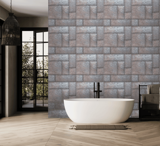 Modern bathroom with a freestanding bathtub against a patterned tile wall.